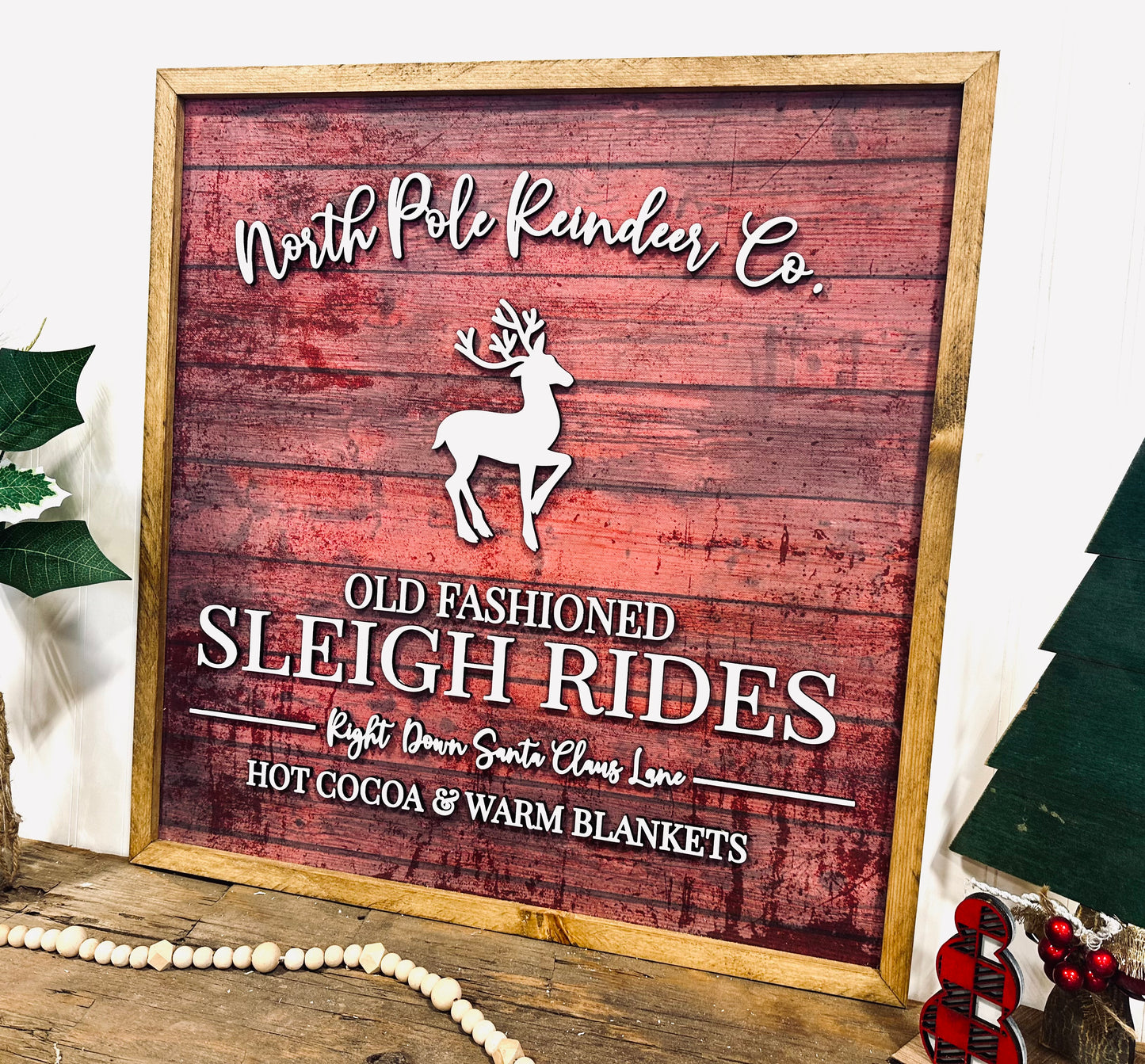 North Pole old fashioned sleigh rides framed sign- Red canvas background