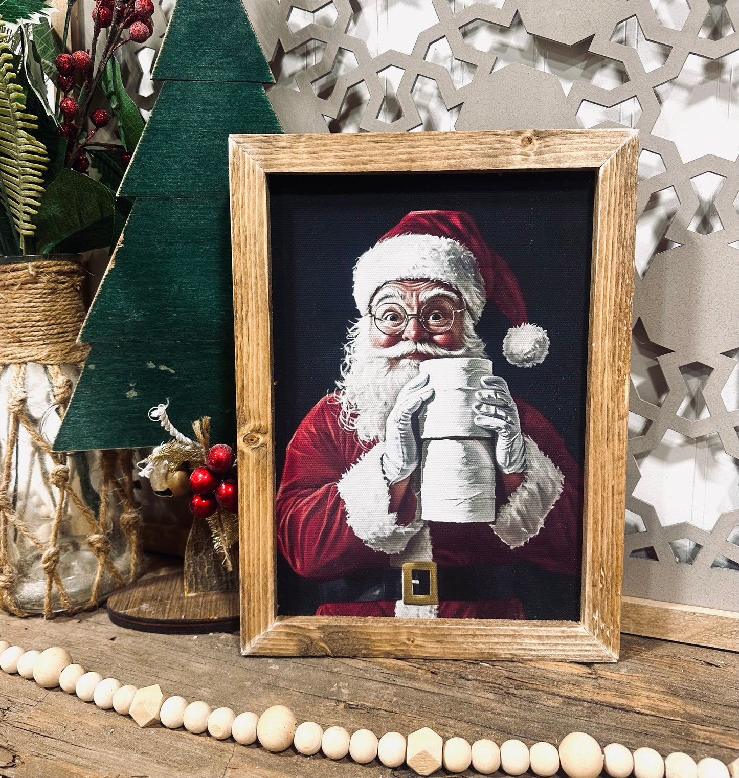 Santa holding toilet paper wood framed canvas print