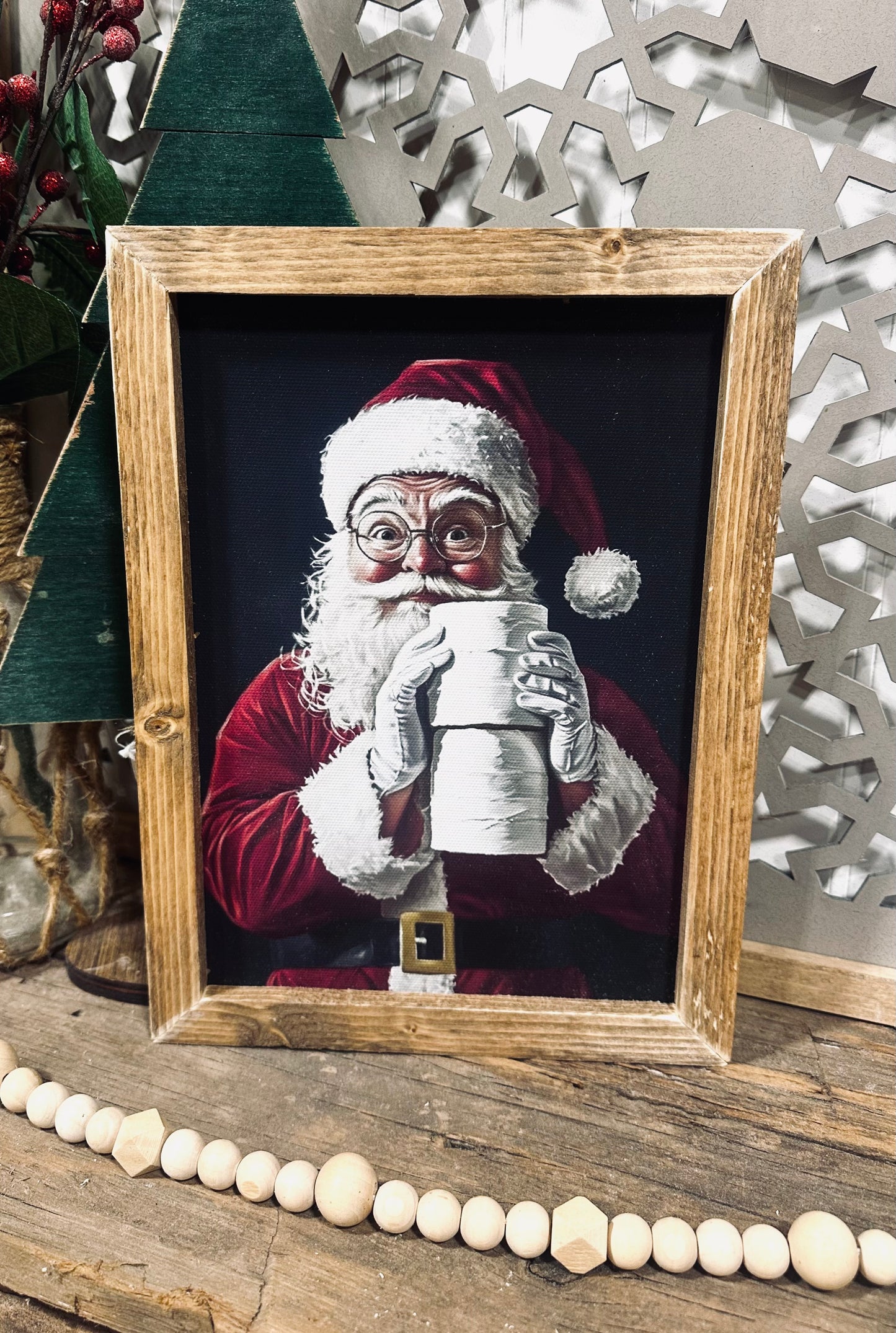 Santa holding toilet paper wood framed canvas print