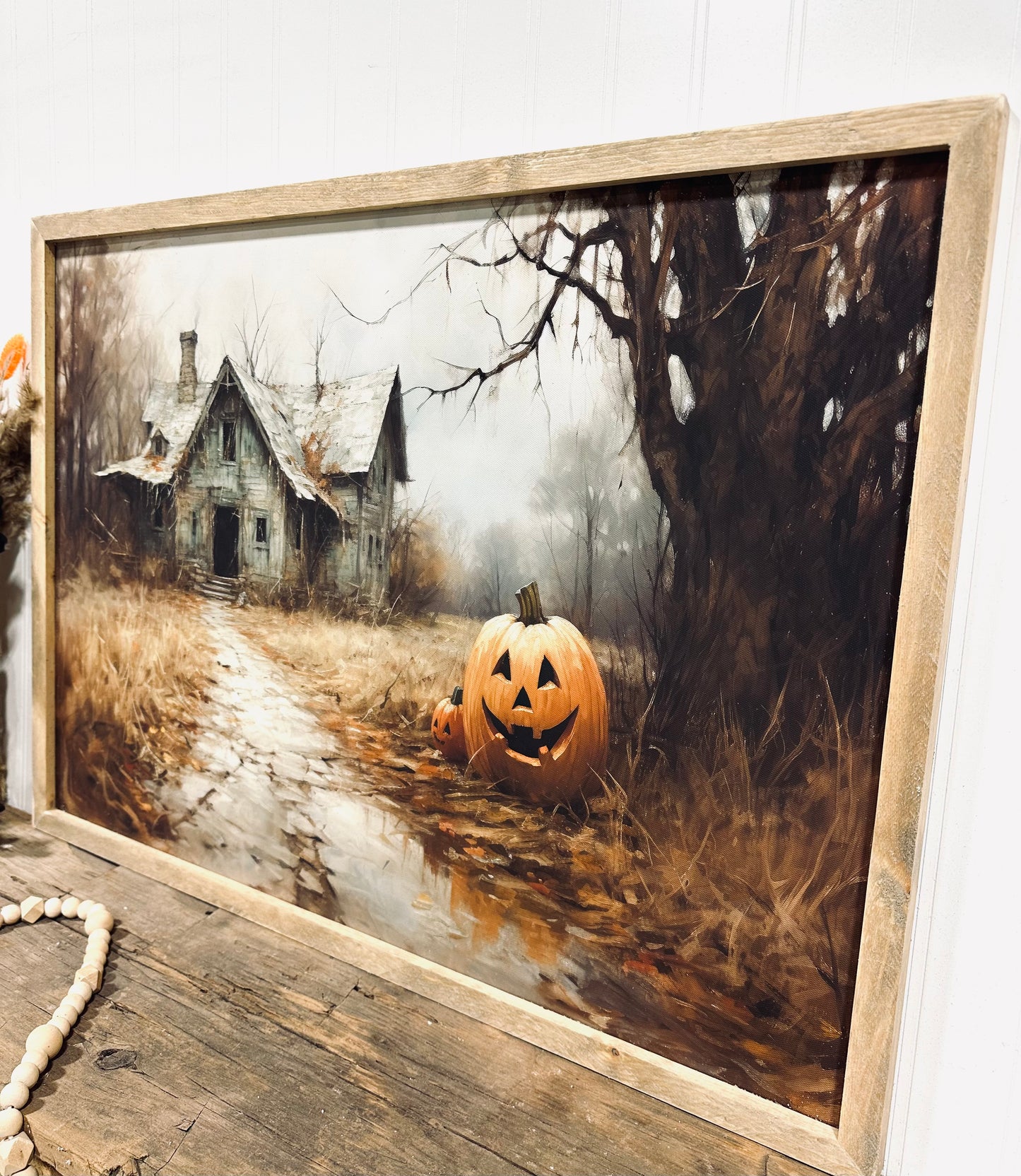 Spooky Halloween house with Jack-o-lantern framed canvas sign