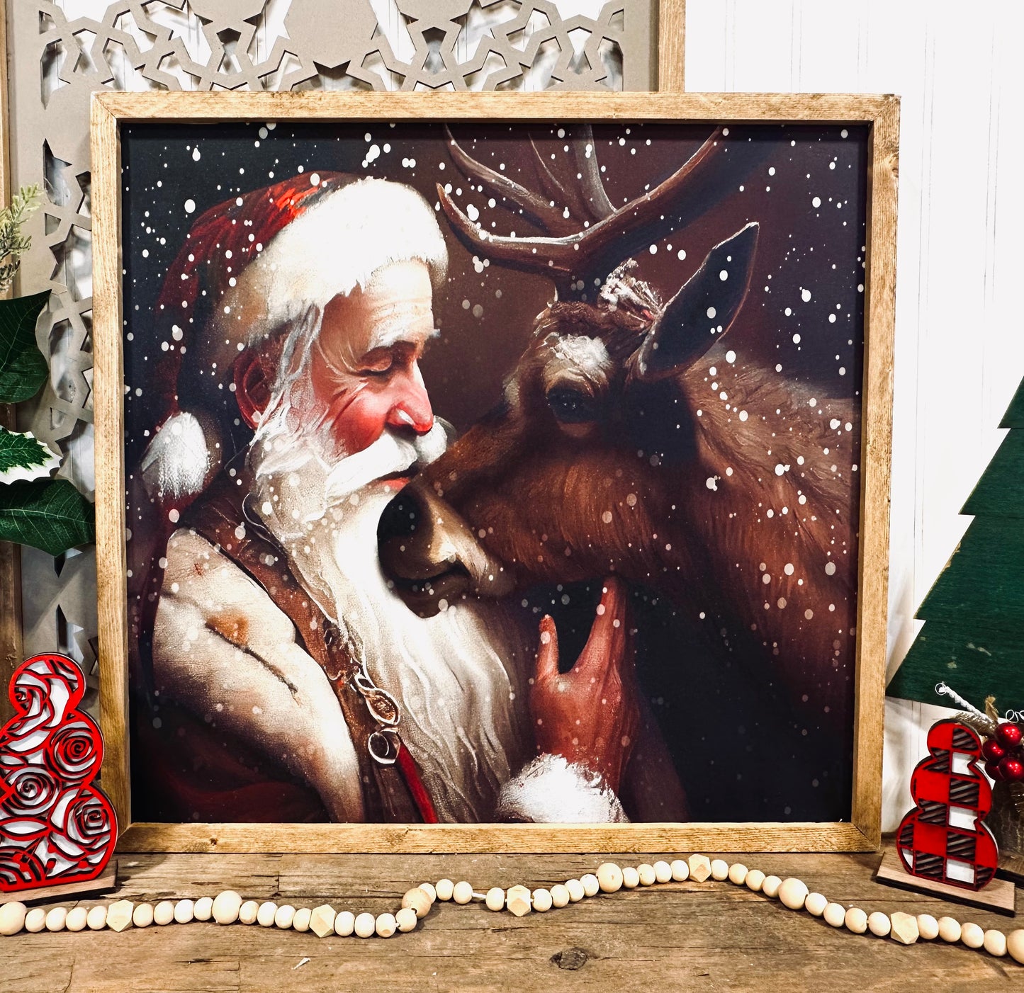 Classic Santa kissing reindeer wood framed canvas print