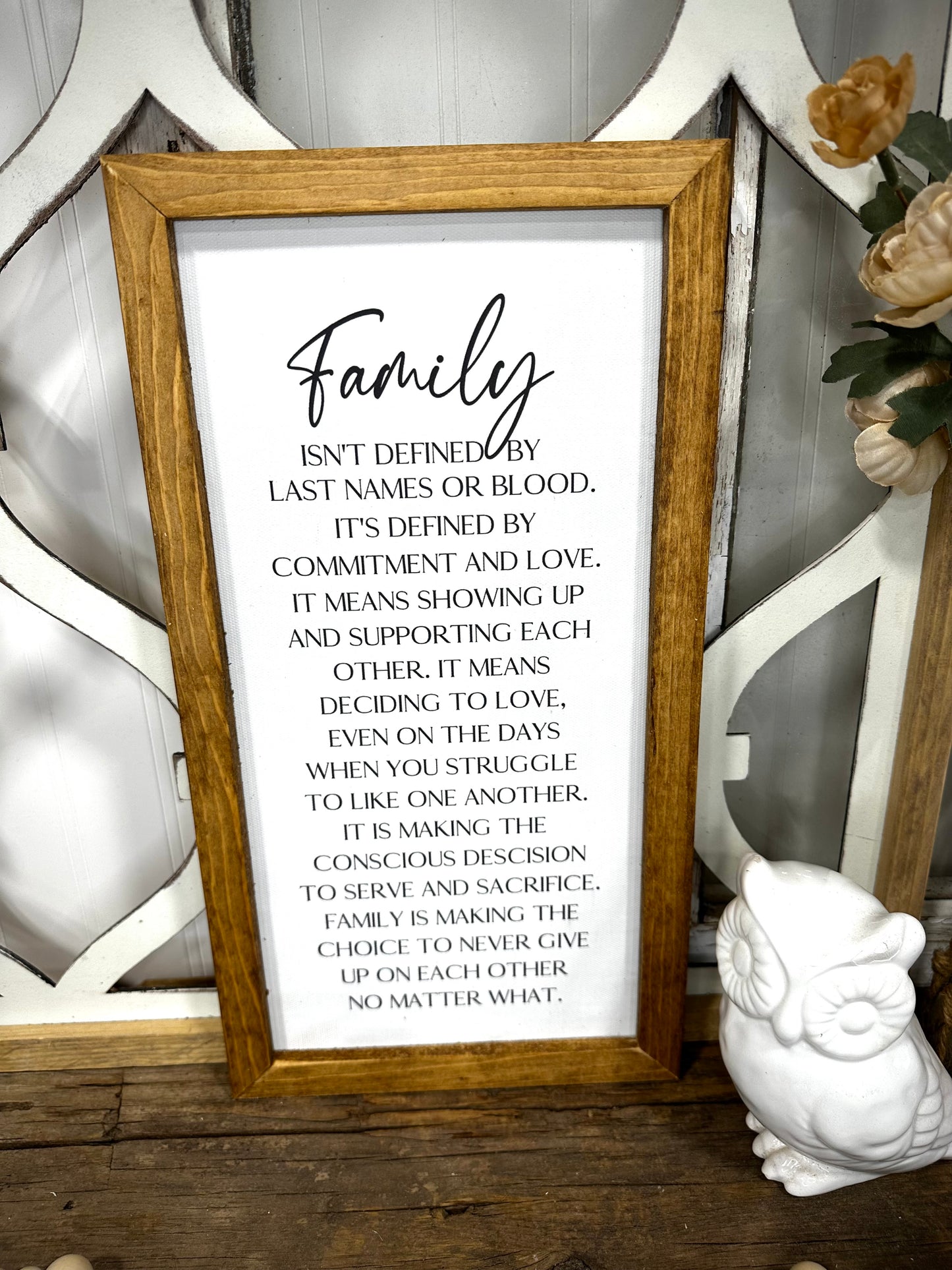 Family isn’t defined only by last name wood framed canvas print