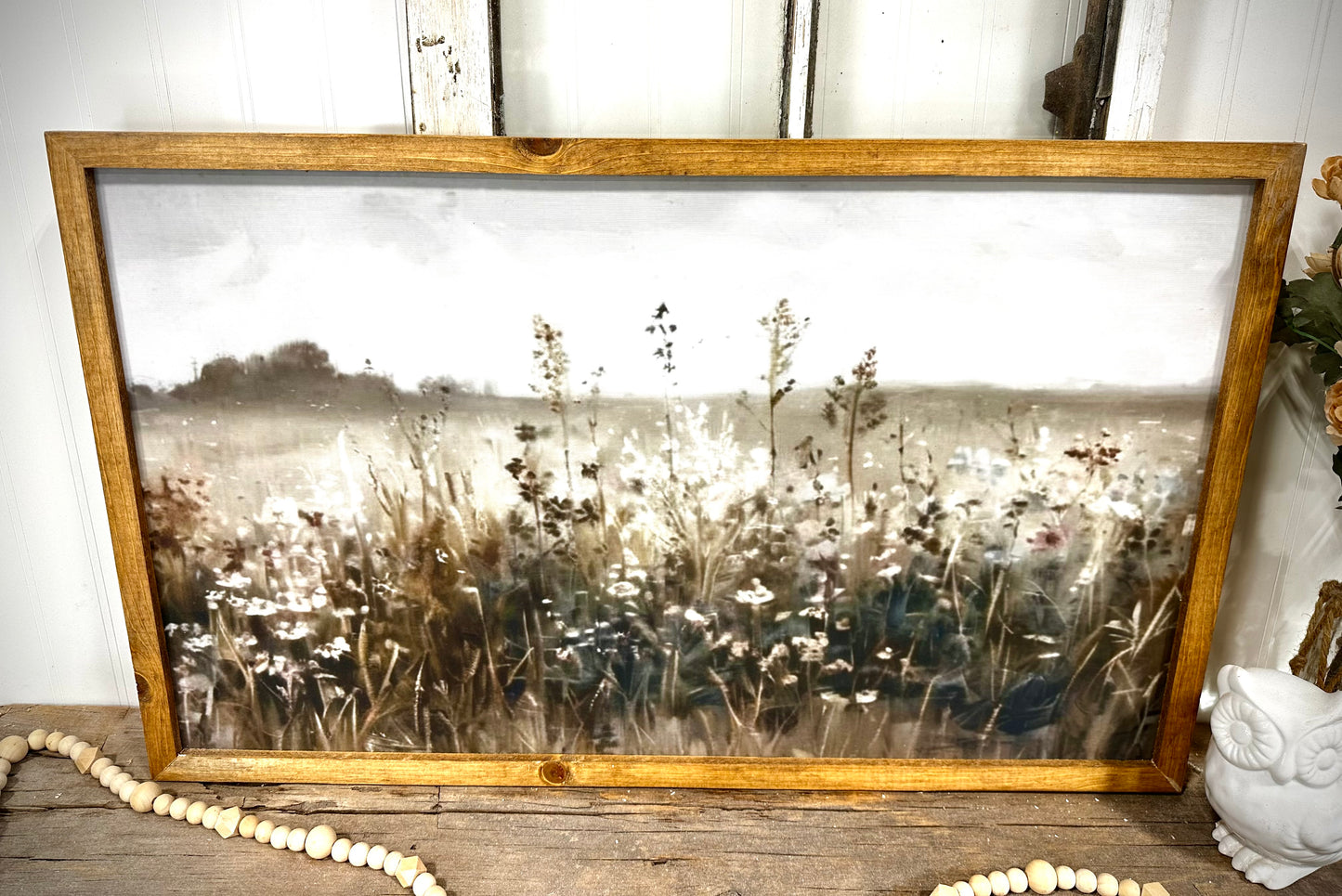 Muted blue moody flower field wood framed canvas print