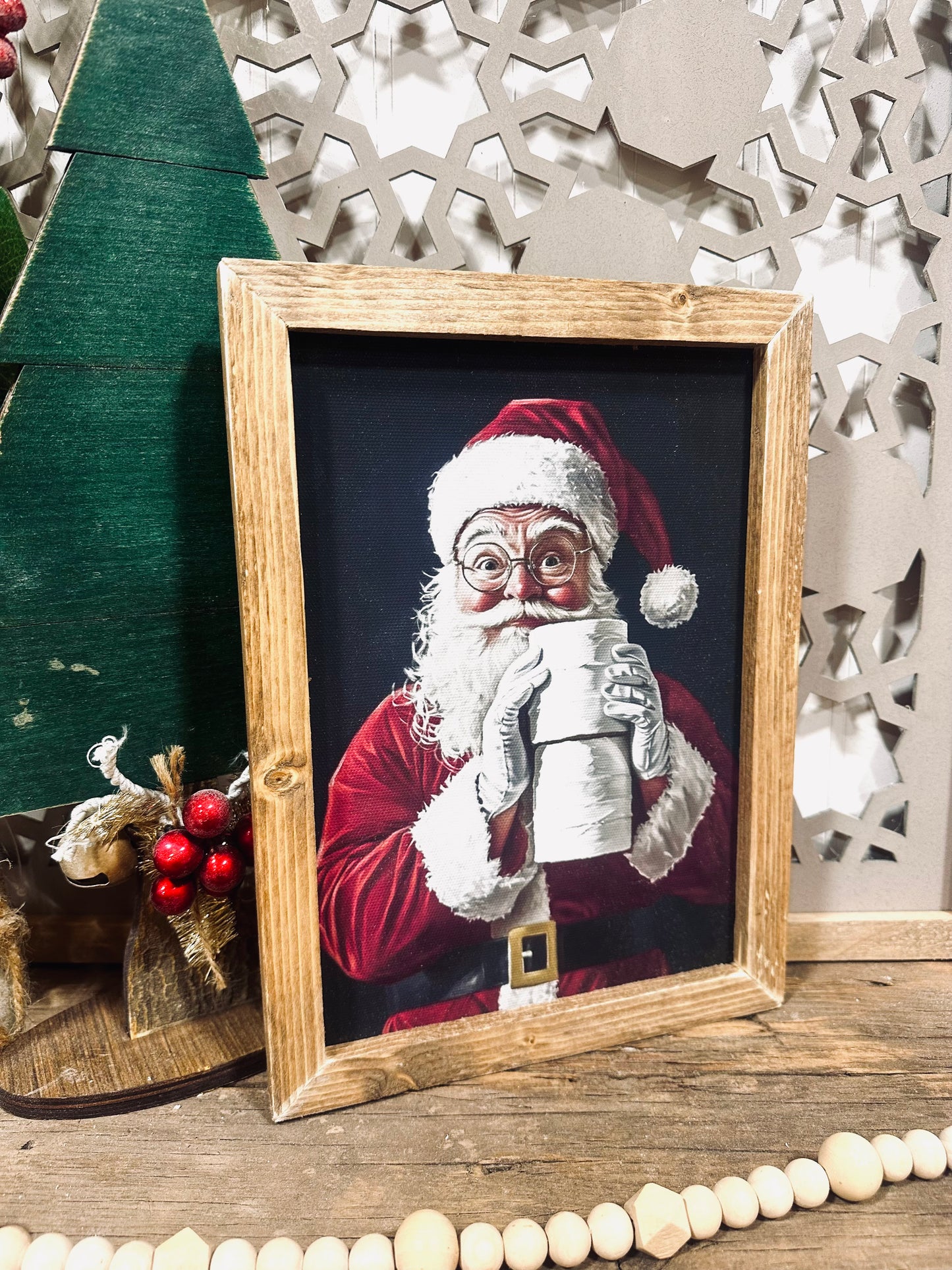 Santa holding toilet paper wood framed canvas print