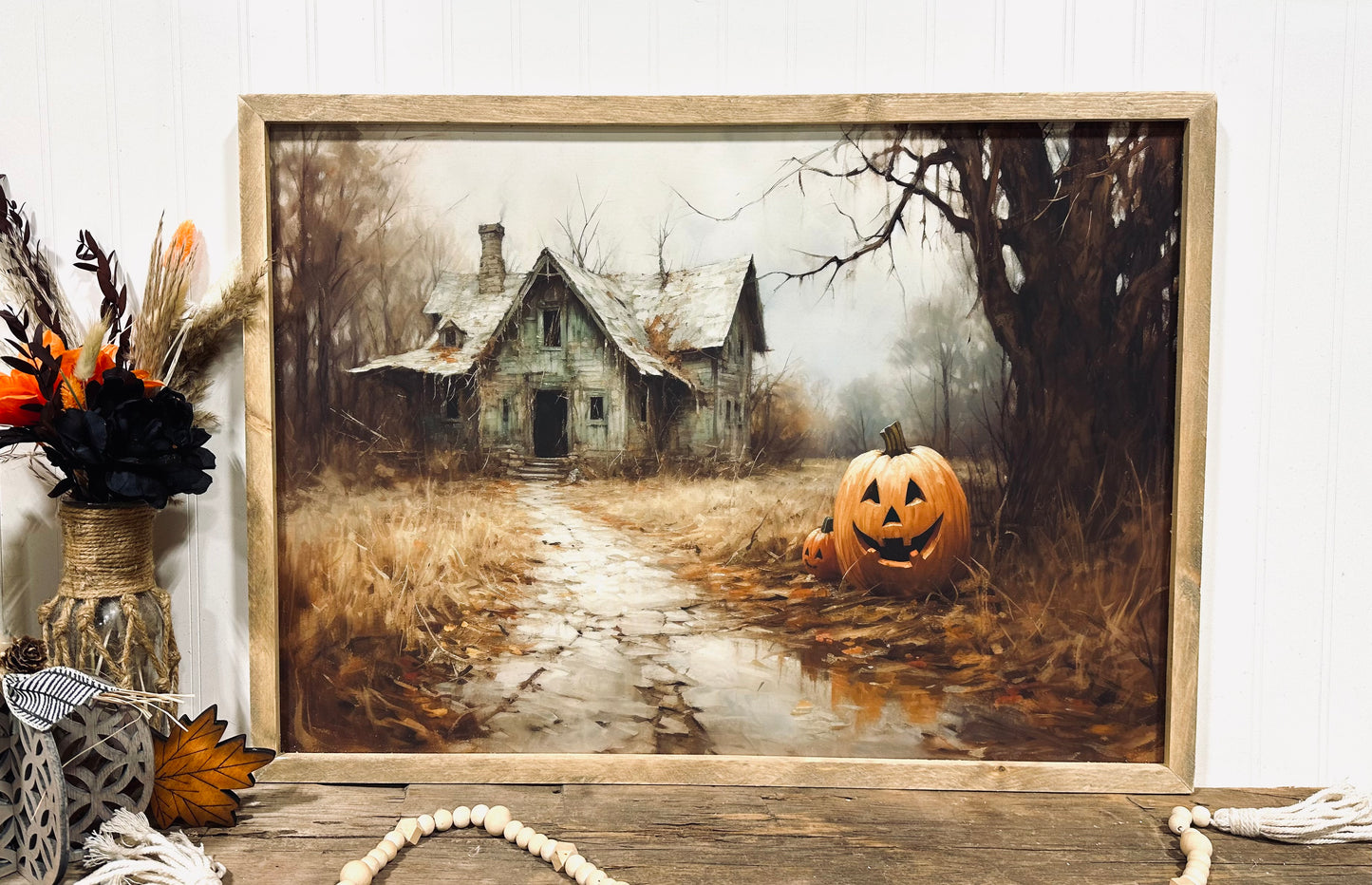 Spooky Halloween house with Jack-o-lantern framed canvas sign