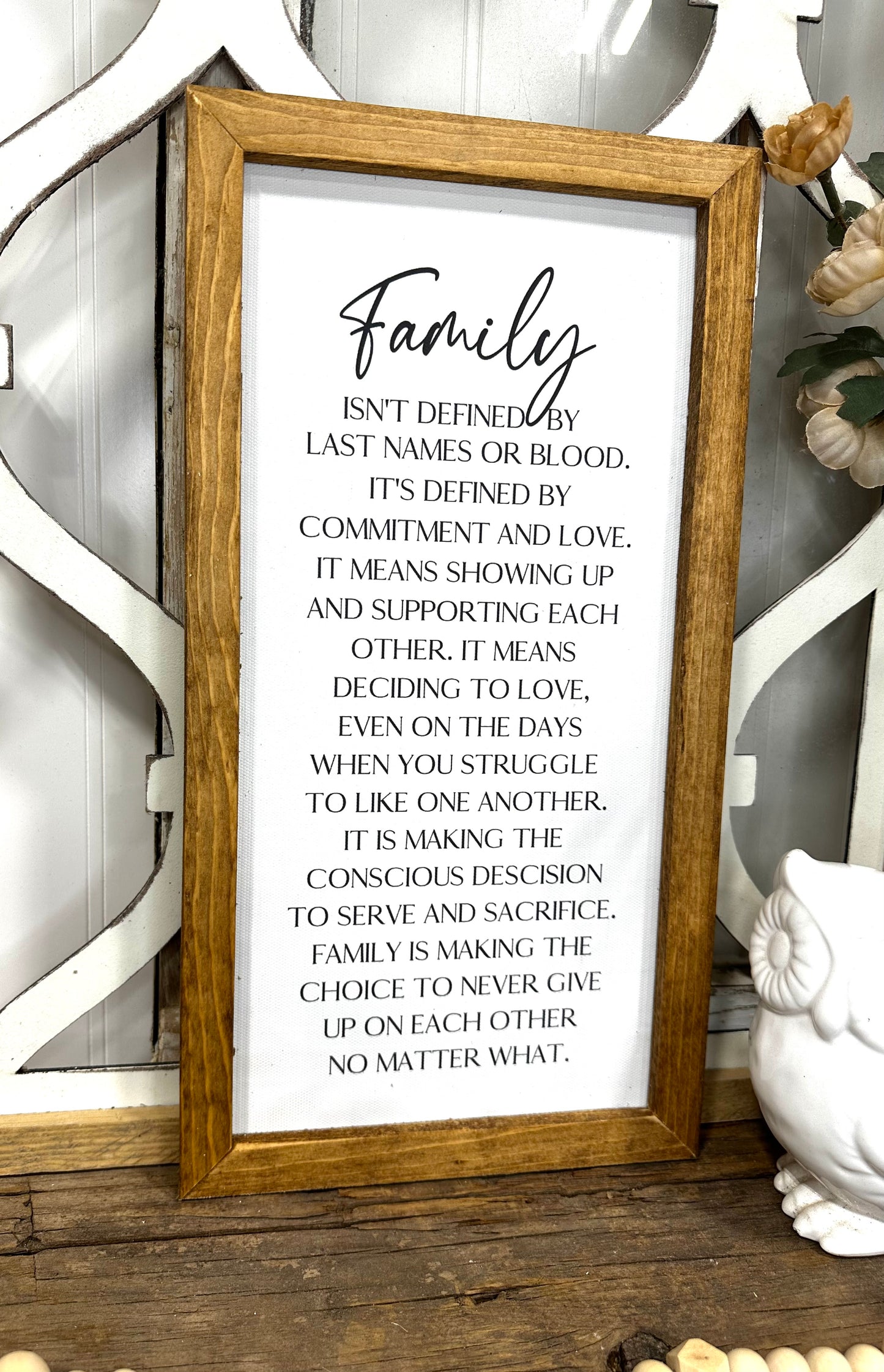 Family isn’t defined only by last name wood framed canvas print