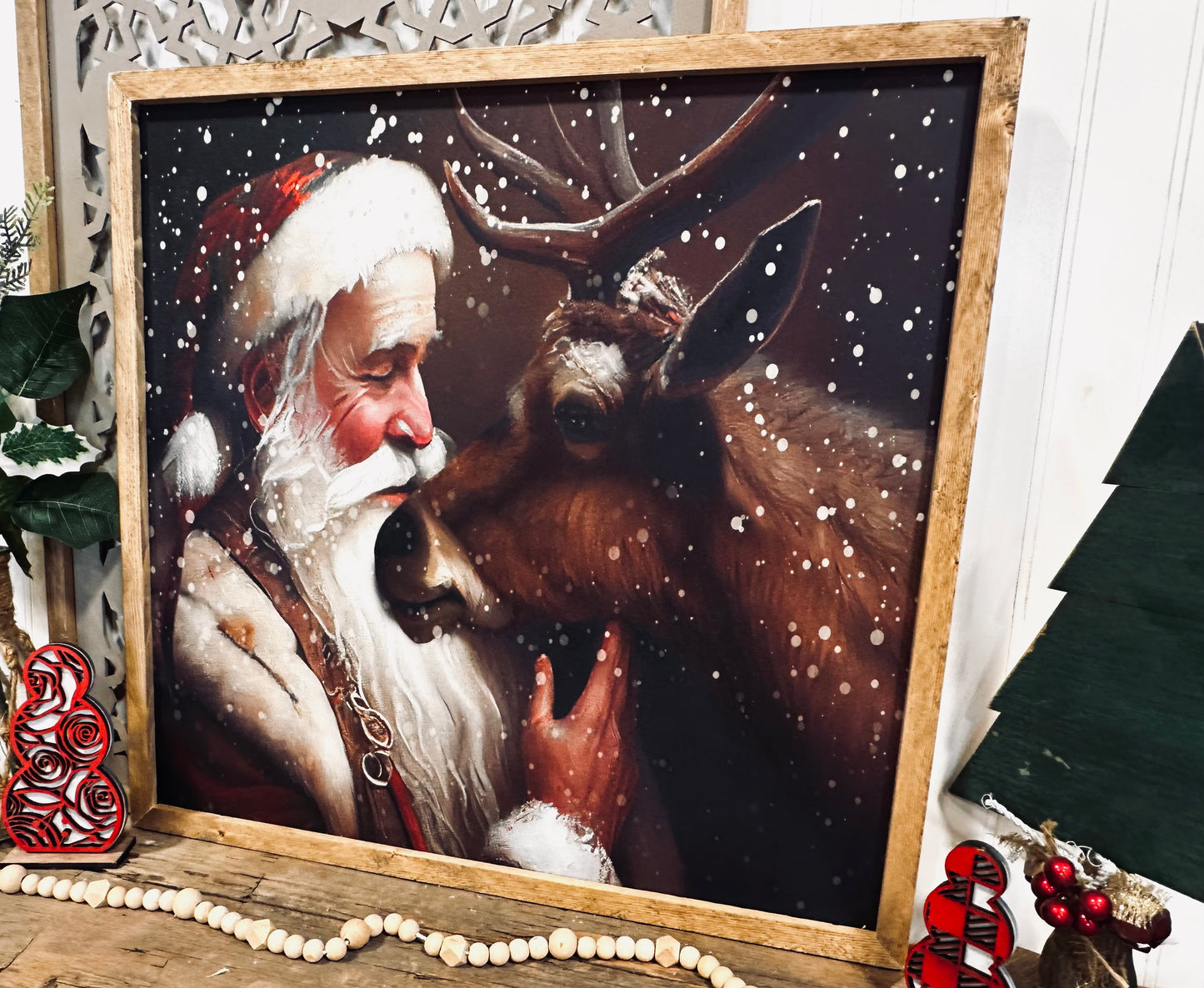 Classic Santa kissing reindeer wood framed canvas print