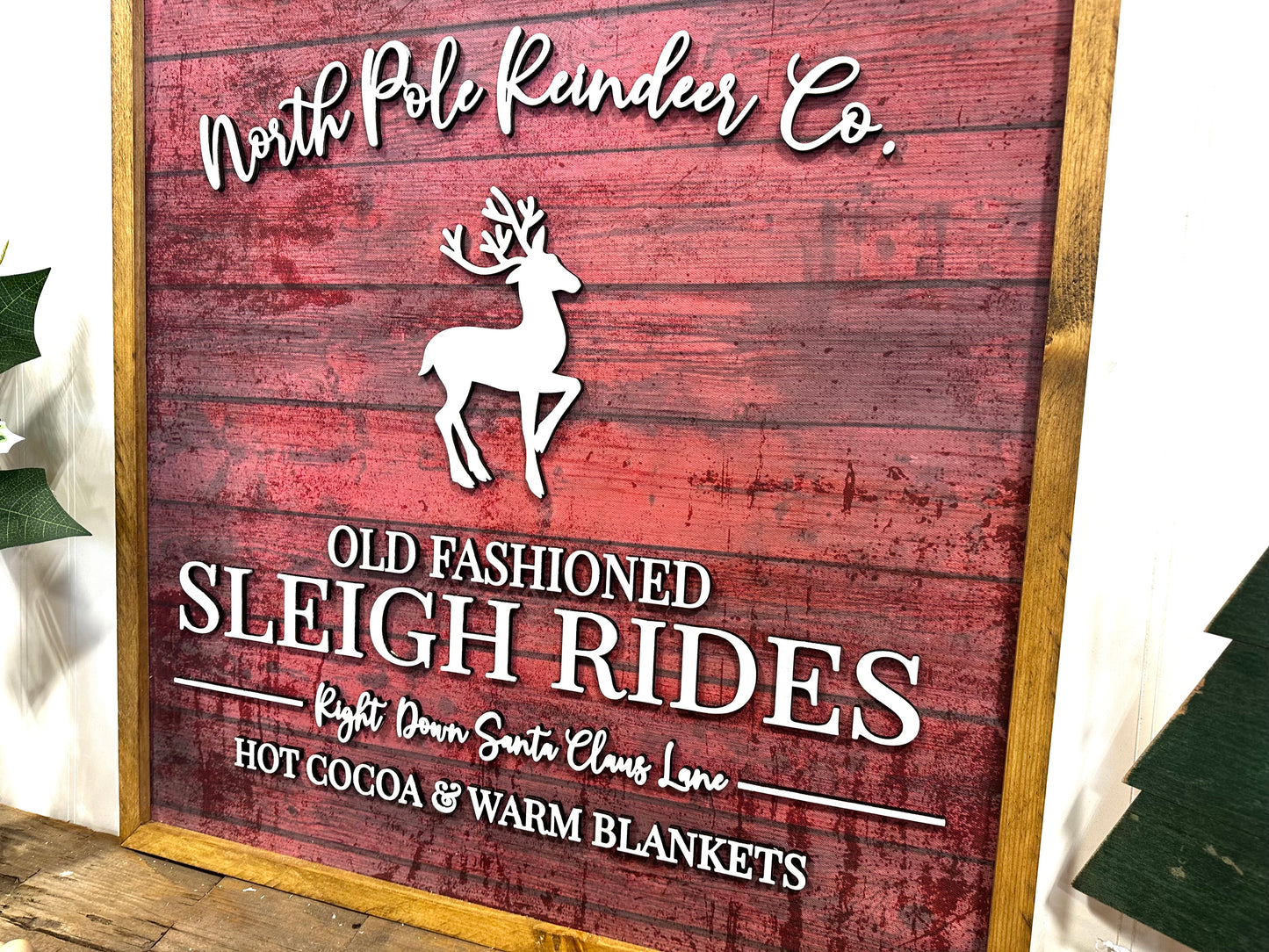 North Pole Reindeer Co wood framed sign