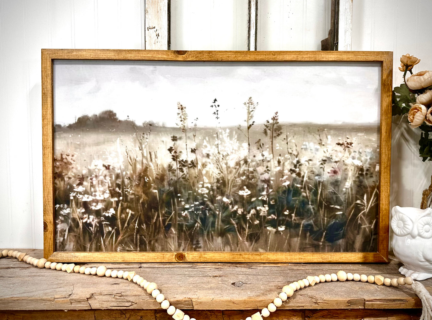 Muted blue moody flower field wood framed canvas print