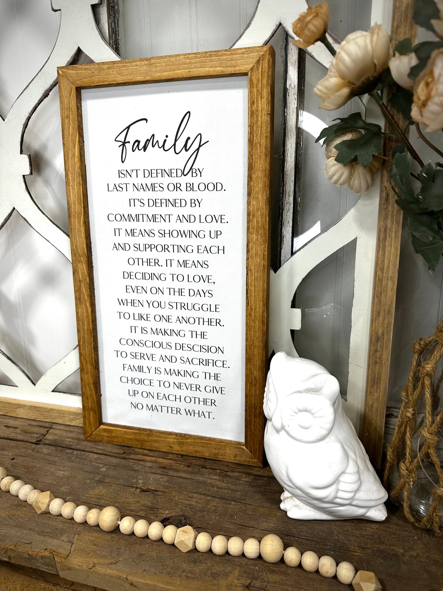 Family isn’t defined only by last name wood framed canvas print