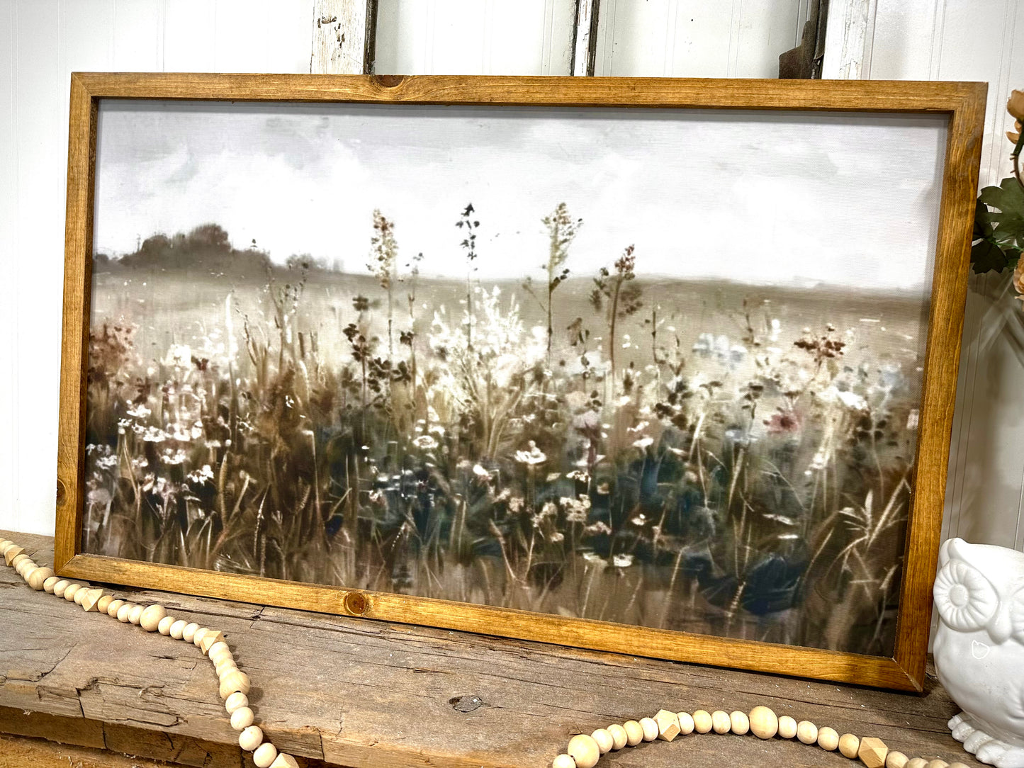 Muted blue moody flower field wood framed canvas print