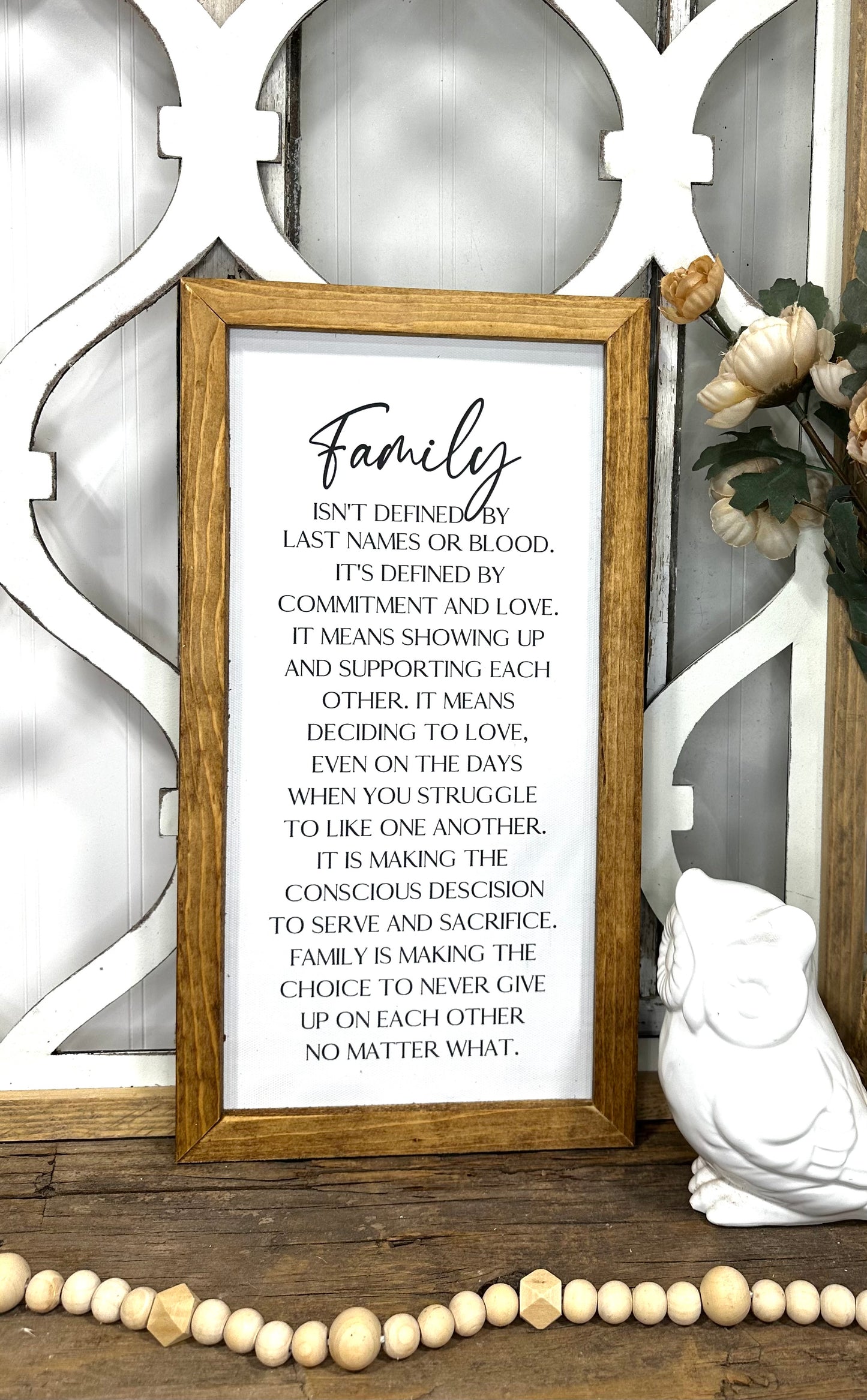 Family isn’t defined only by last name wood framed canvas print