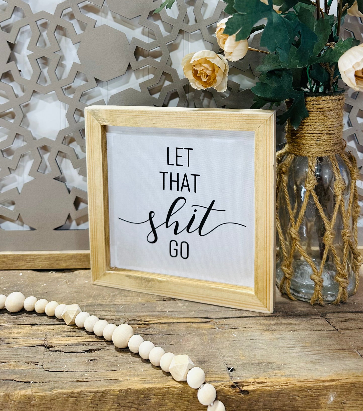 Let that shit go wooden framed canvas sign