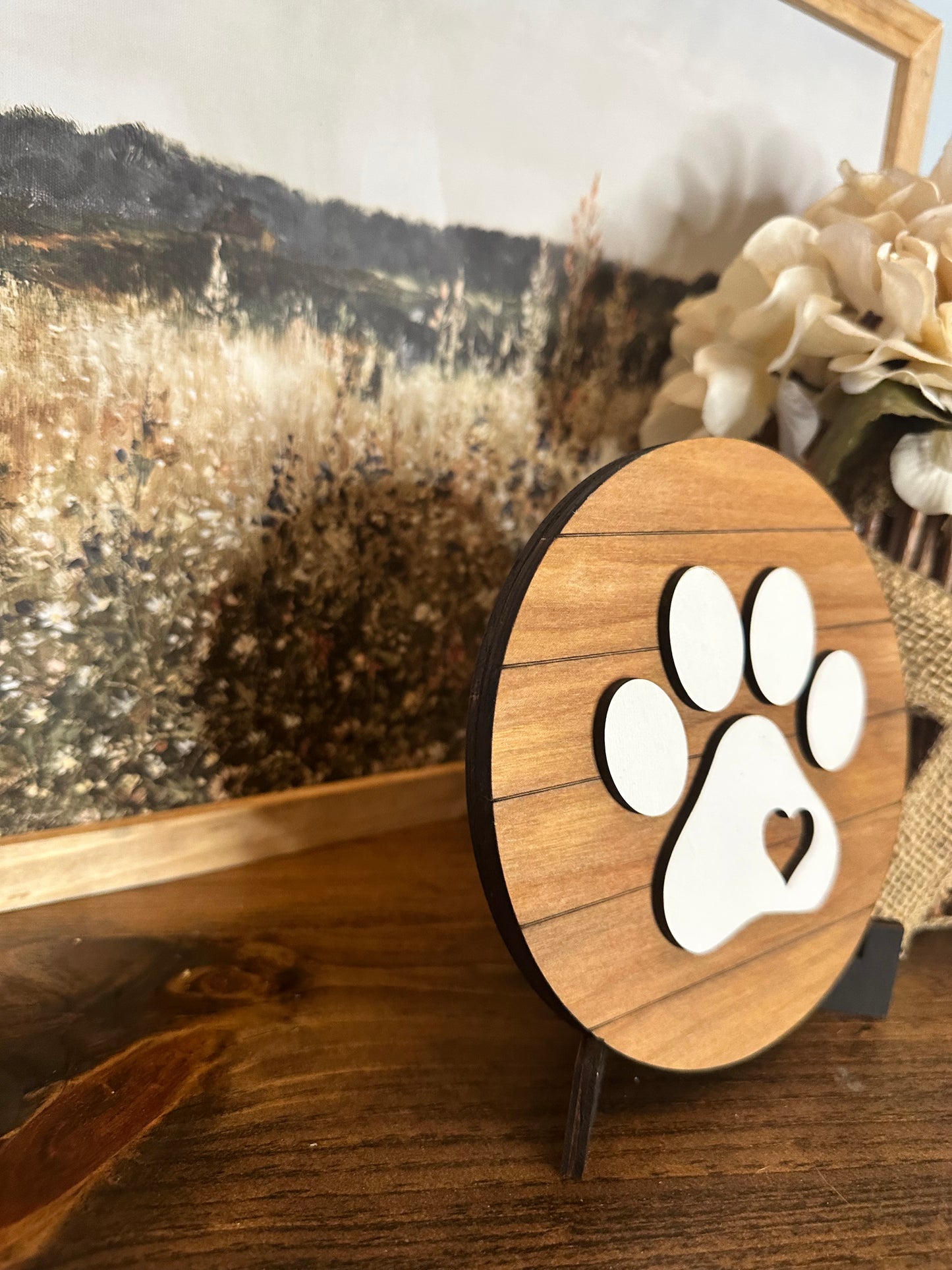 Round paw print sign