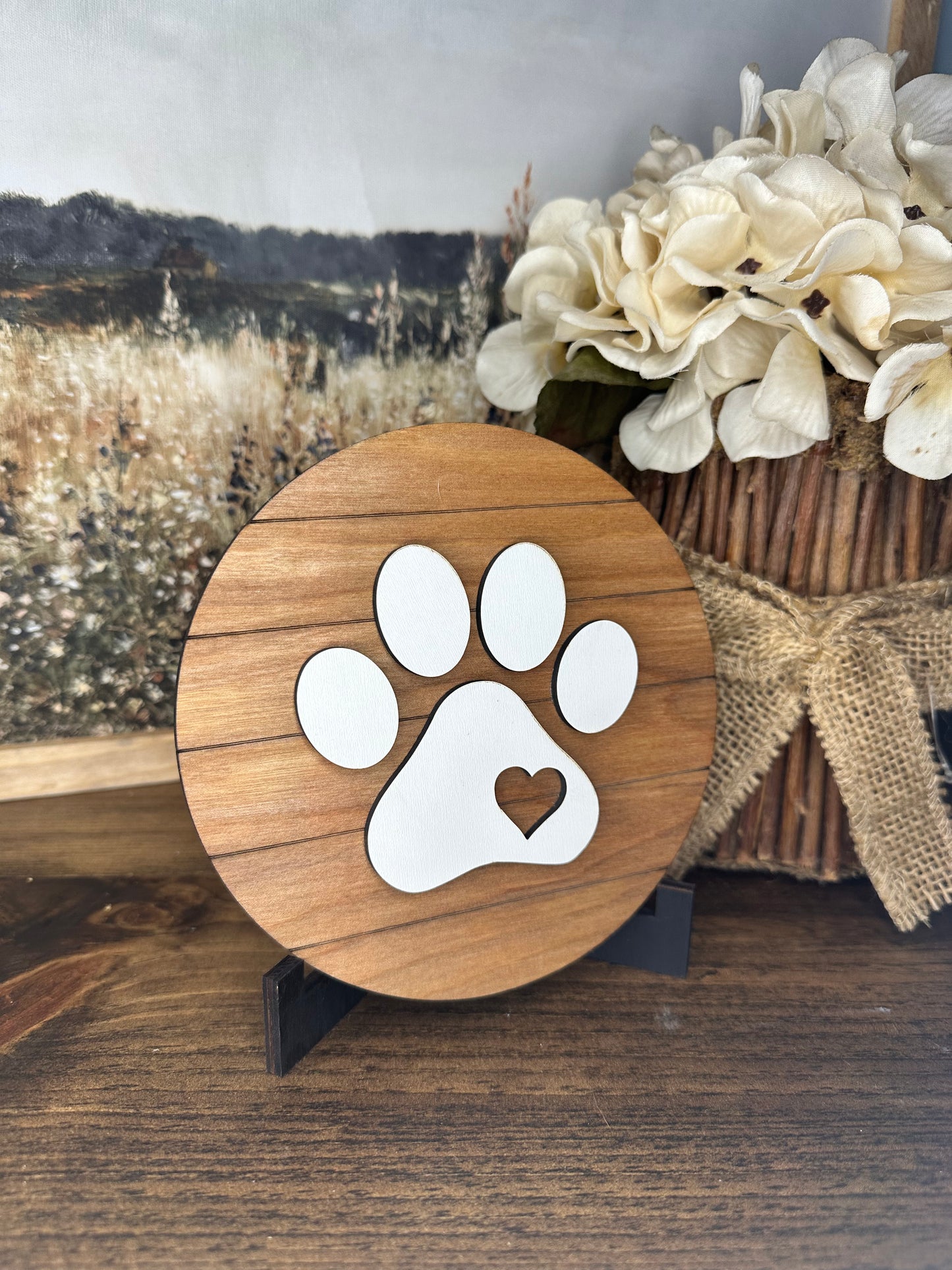 Round paw print sign