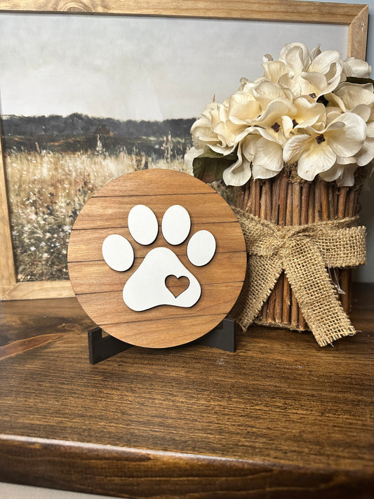 Round paw print sign