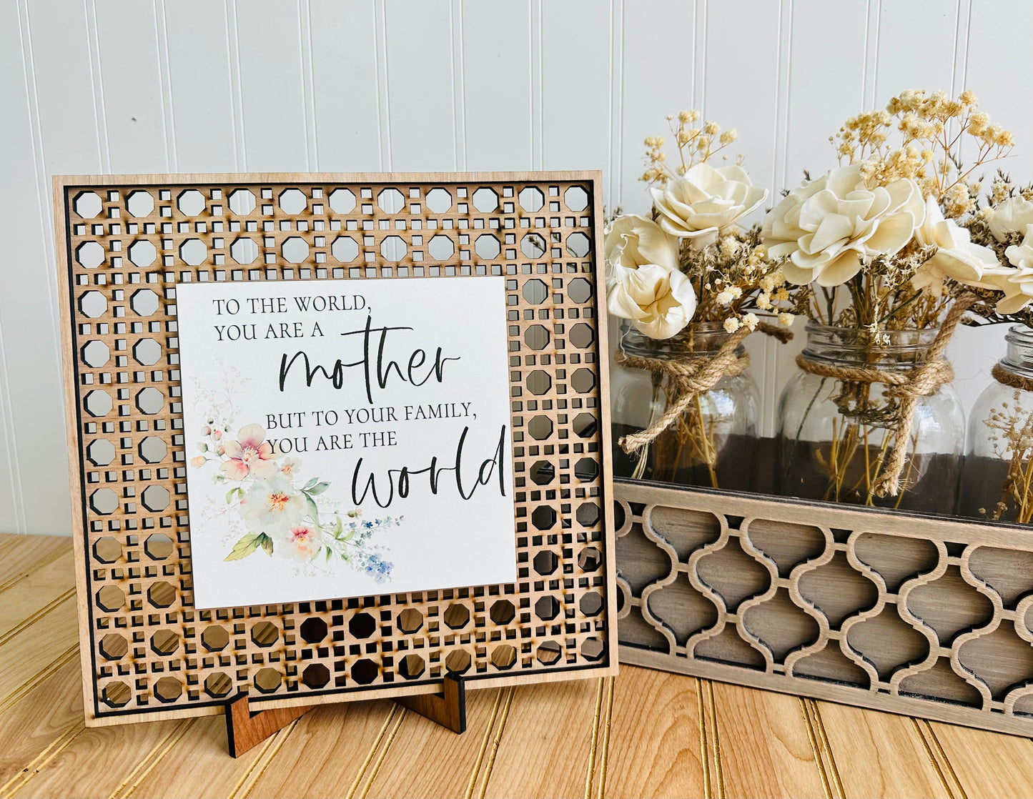 To the world you are a mother but to your family you are the world rattan table top sign