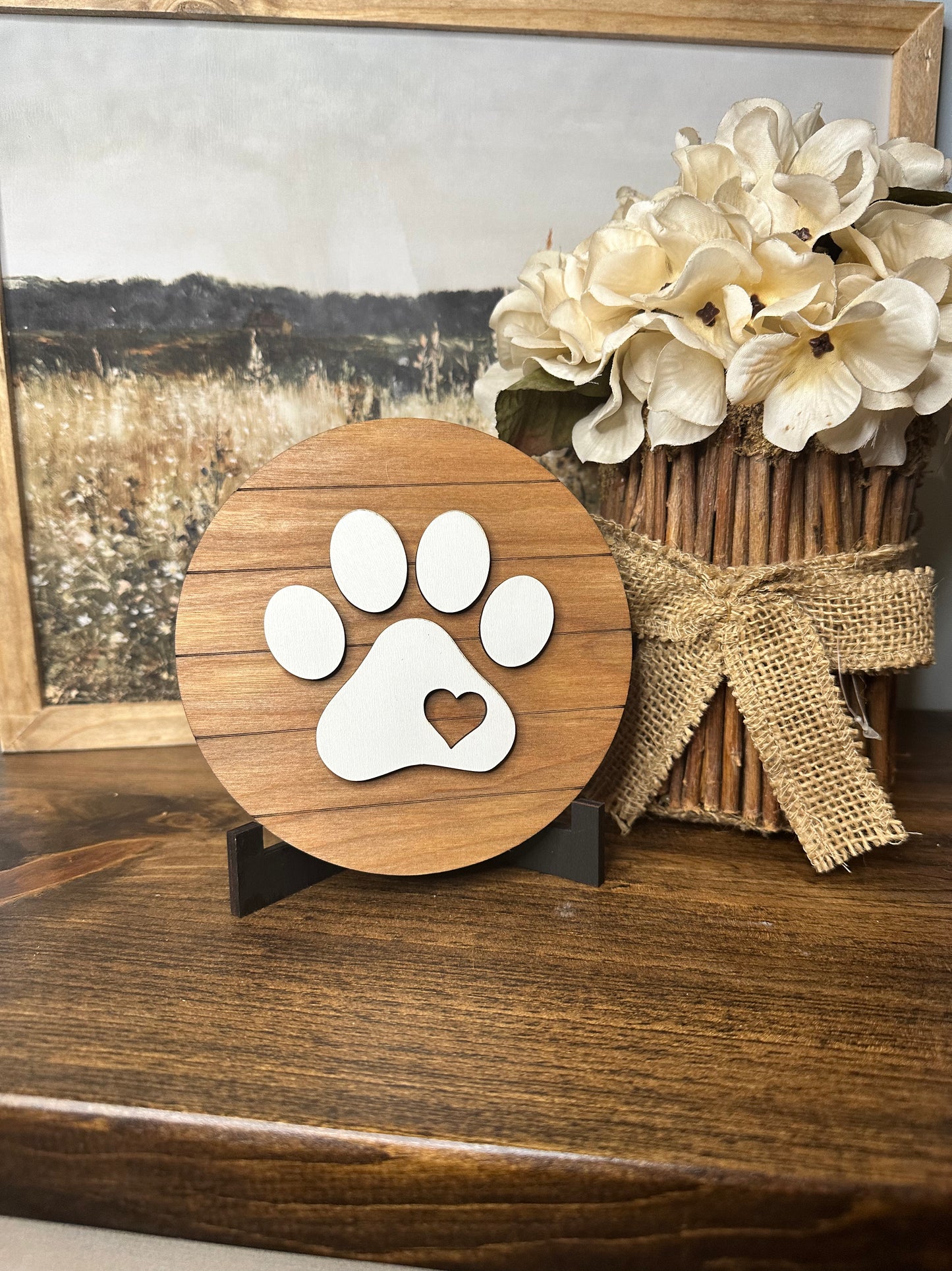 Round paw print sign