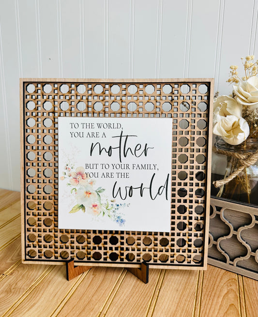 To the world you are a mother but to your family you are the world rattan table top sign