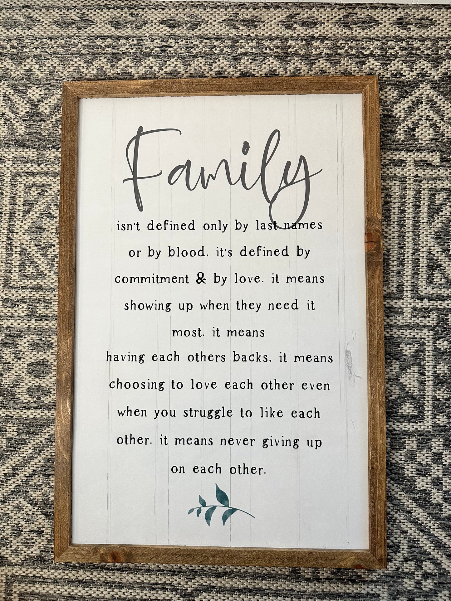 Family isn’t defined only by last name or by blood farmhouse wood sign