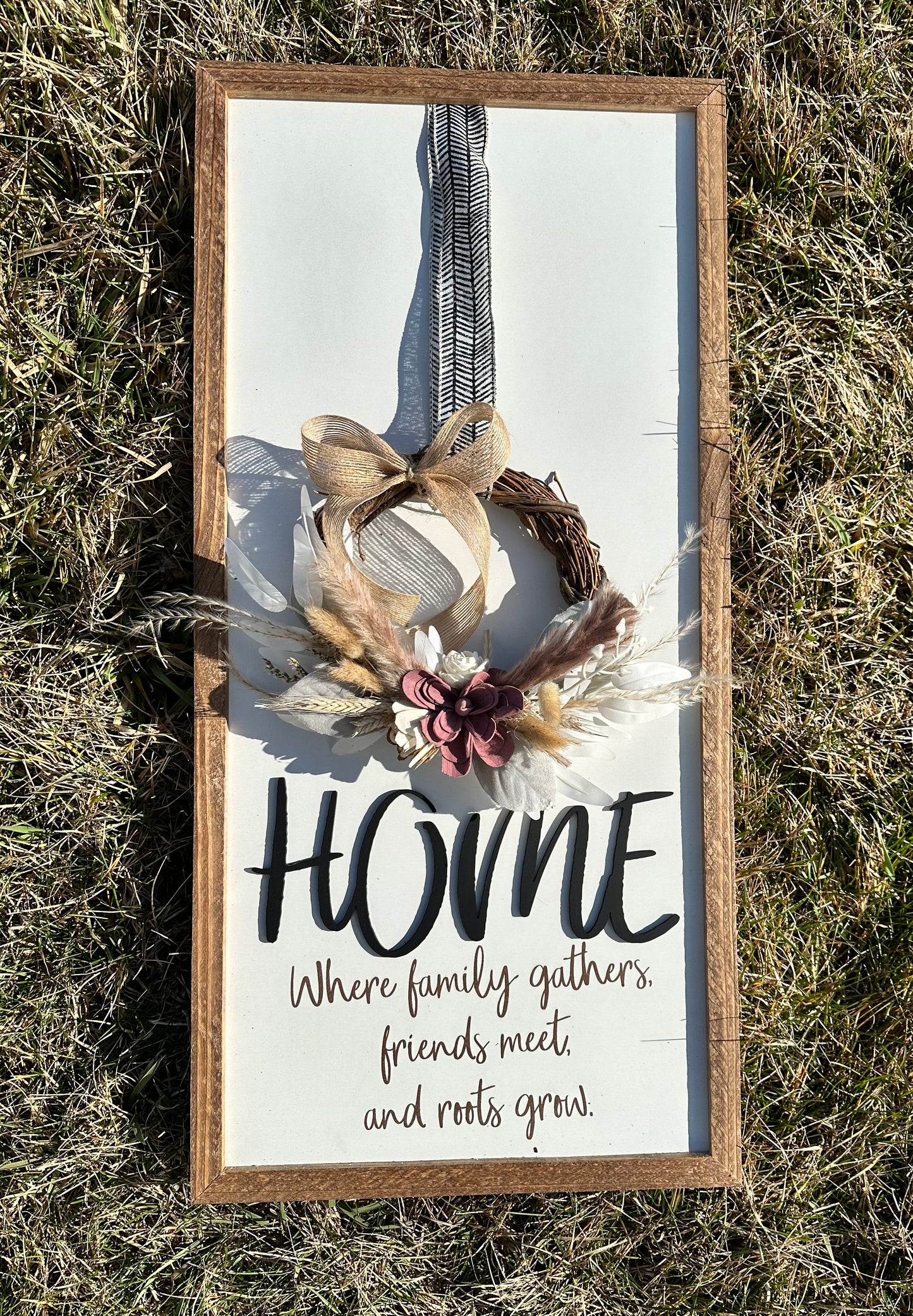 Home where family gathers friends meet and roots grow farmhouse sign