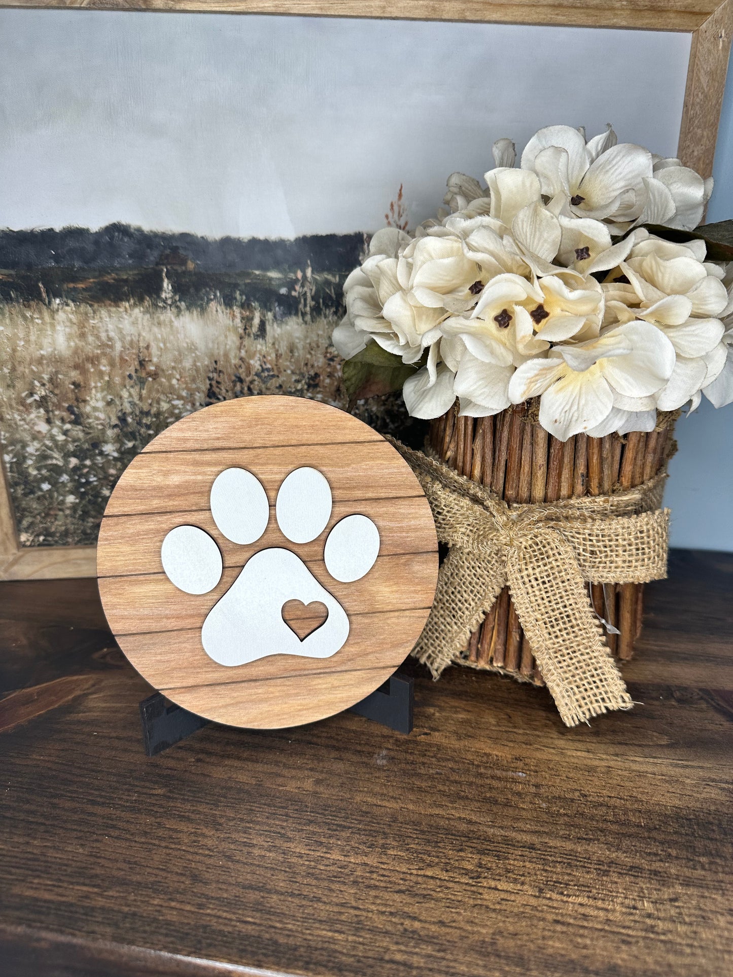 Round paw print sign